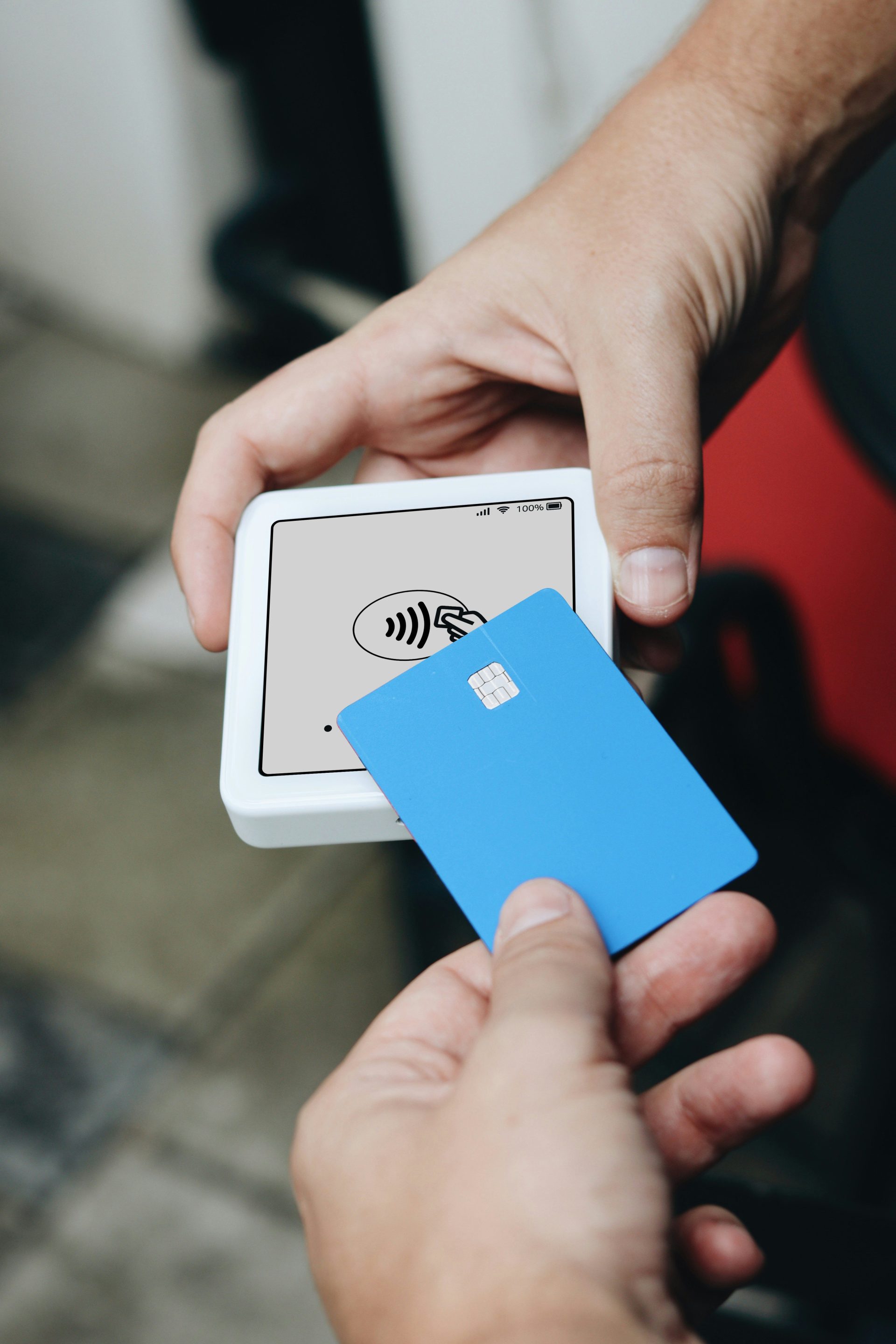 A person is holding a credit card in their hand